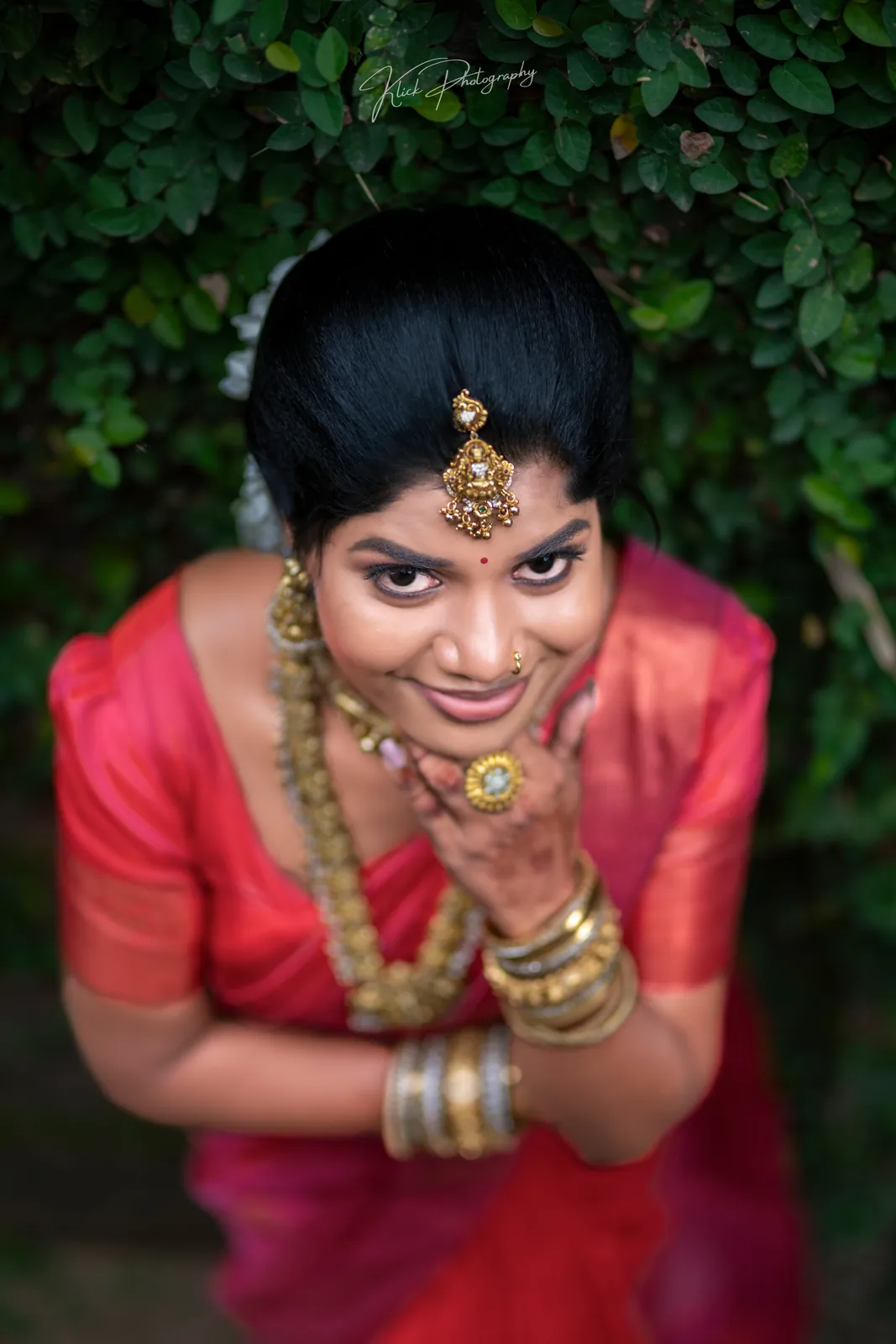 Close-up bridal portrait with traditional gold jewellery